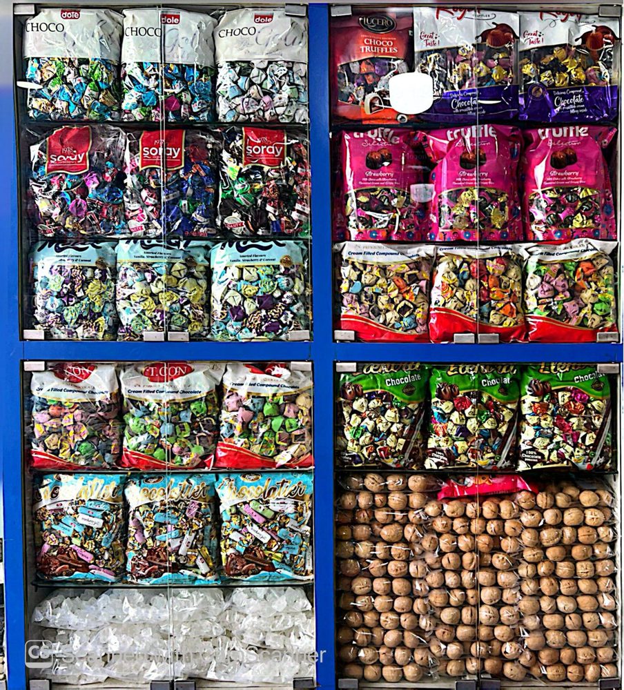 Close view of chocolate and candy shelves in the shop